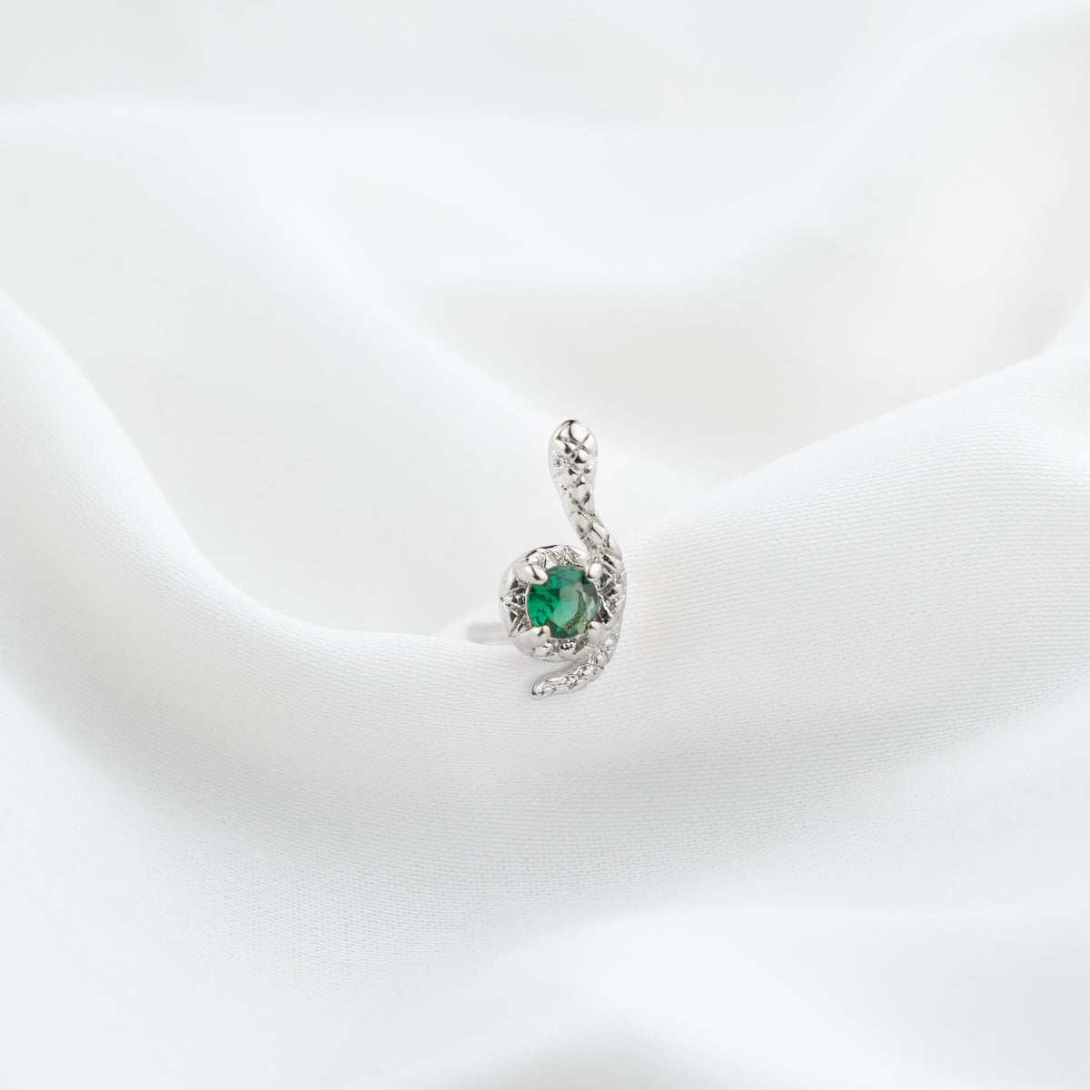 Silver Emerald Curling Snake Stud