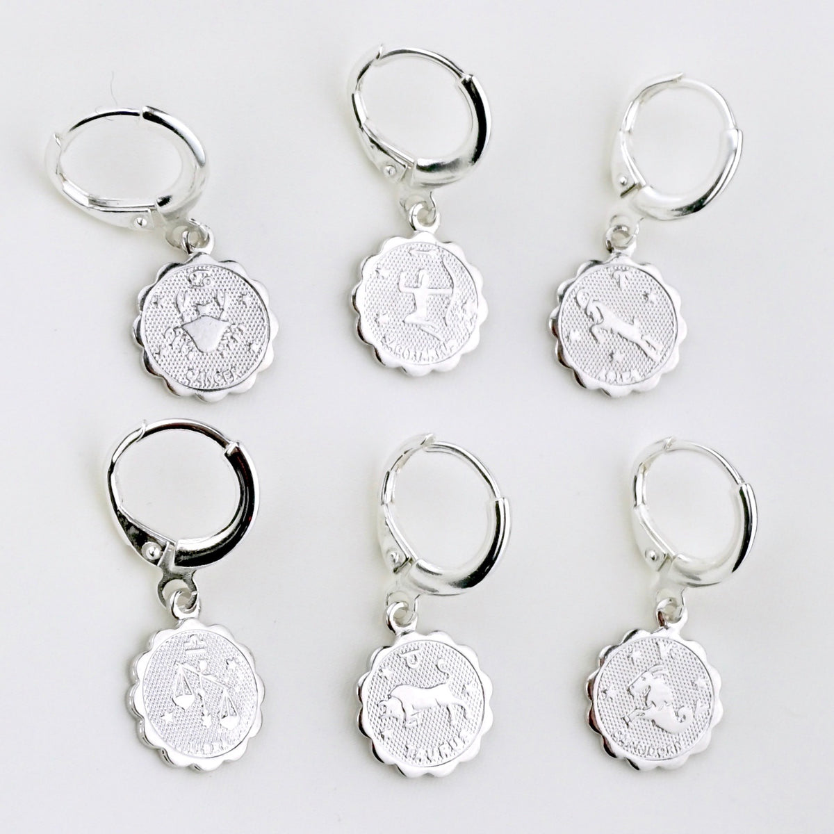Silver Star Sign Coin Earring